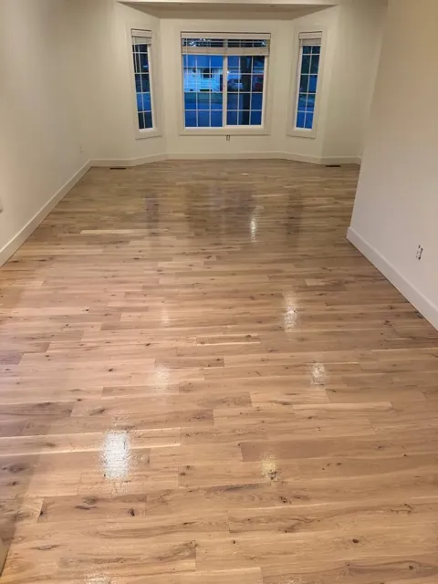 Refinished hardwood floor restored to a fresh finish