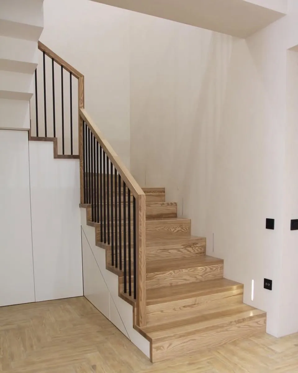 Oak staircase matched to herringbone hardwood floor